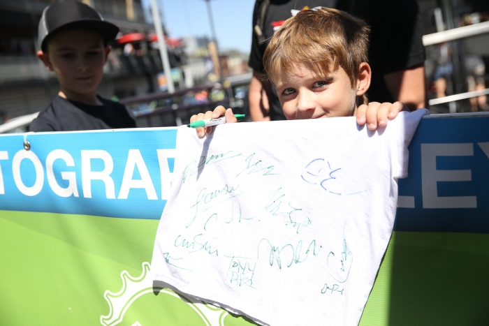 A happy young fan at Autograph Alley.