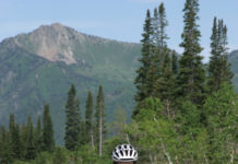 Big Cottonwood Canyon Challenge The Big Cottonwood Canyon Porcupine Hillclimb takes place in July each year. A rider is shown here with Mt. Raymond in the background. Photo: Dave Iltis