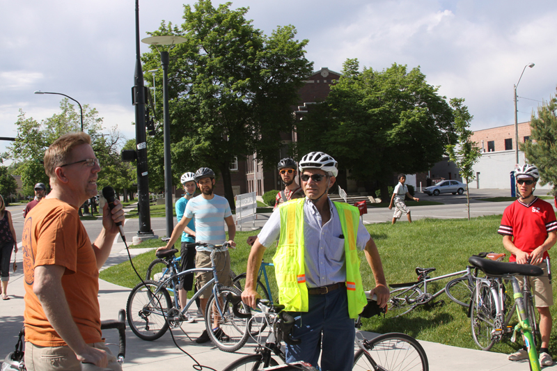 bikeable cities Salt Lake City. Mayor Becker (yellow vest) listens to new perspectives on bikeable cities.