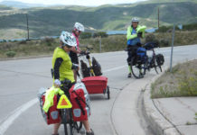 Overnight Bike Tours from Salt Lake City The overnighter group above Park City getting ready to descend to Hwy 40 at the Mayflower Exit. The Jordanelle Reservoir is in the background.