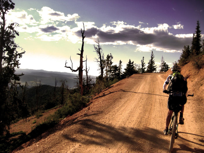 Lynda Wallenfels on the long climb out of Hatch, Utah to the top of the Paunsaugunt Plateau.