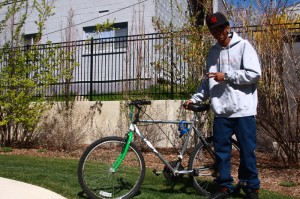 Salir Omer, 19, is a refugee who received a bicycle from the Salt Lake