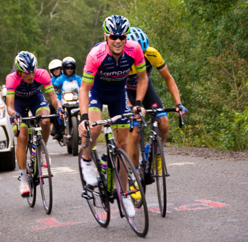 Chris Horner leading Tom Danielson (in yellow) and teammate Winner