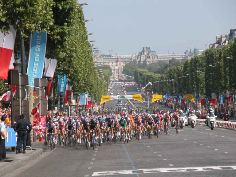 The peloton at the top of the Champs-Élysées in the final stage of the 2004 Tour de France. Photo by David Ward