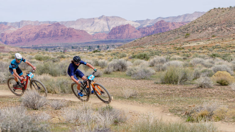 Zach Calton leads Justin Lindine through the Red Rocks of Southern Utah. Photo by Matt Ohran