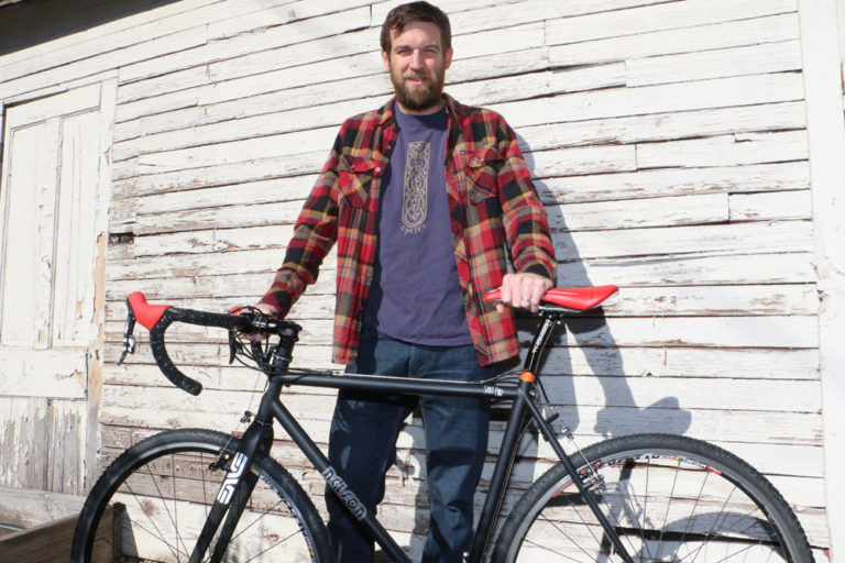 Matthew Nelson shows off one of his new SaltAir bicycles.