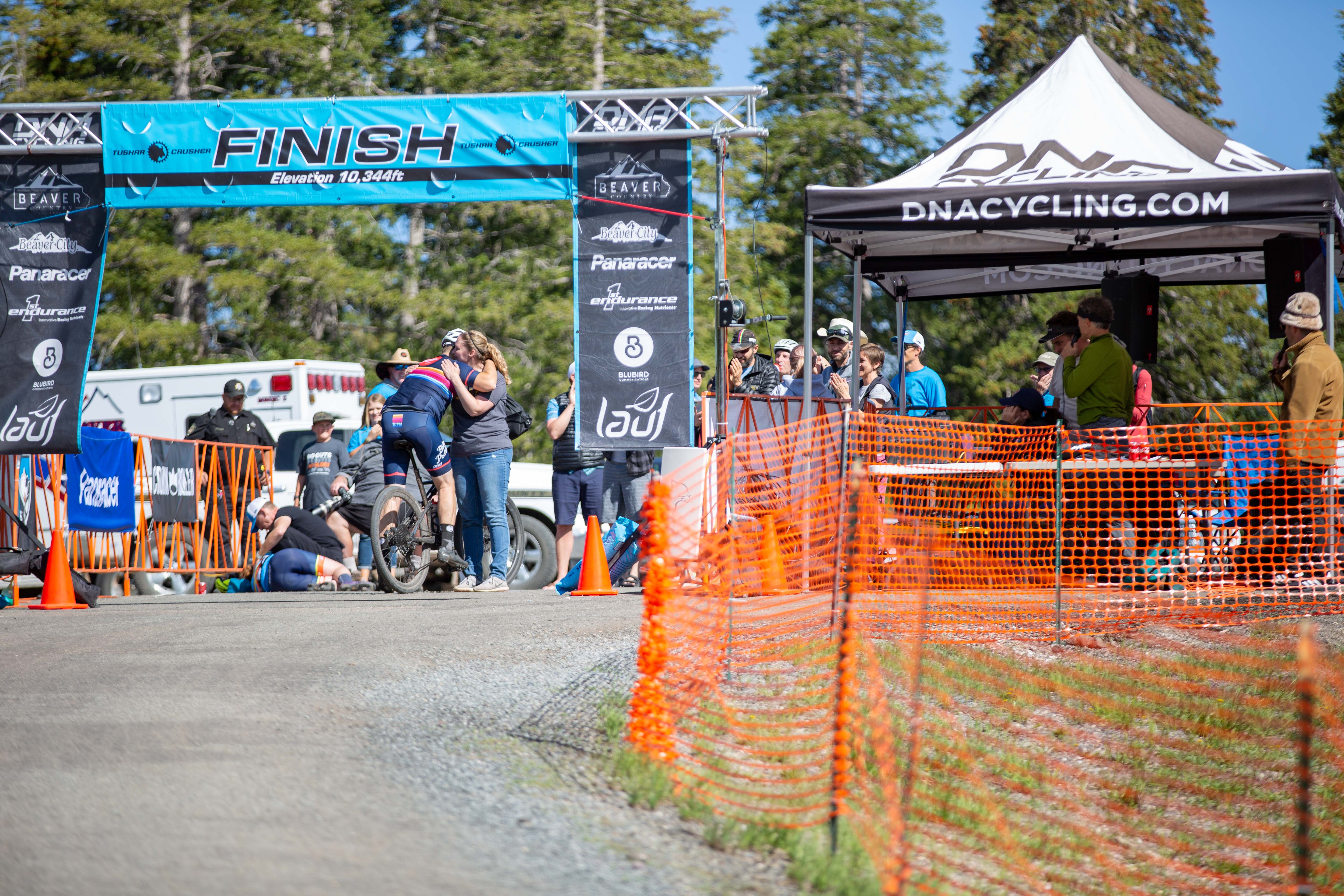 ... and the hug waiting for you across the line. Congratulations Josh. You make us all proud. Photo: Angie Harker.