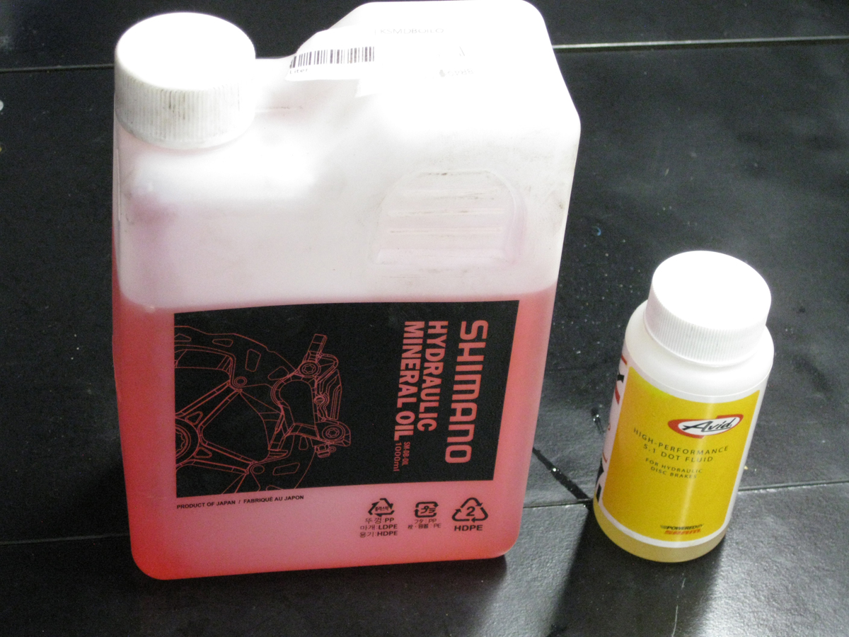 Mineral oil and DOT 5.1 packaging, Shimano and SRAM. Photo by Eric Ramirez