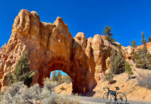 Riding Through the Staircase – The Grand Century Rolling through the rock at Red Rock. Photo by David Collins