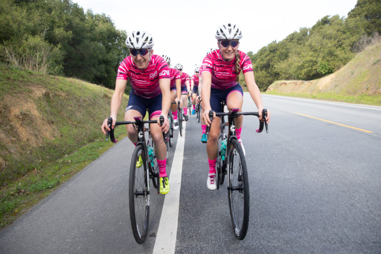 Maggie Coles-Lyster and Katie Clouse lead the team on a training ride. Photo by Catherine Fegan-Kim