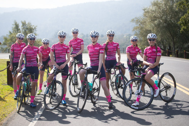 The 2021 DNA Pro Cycling Team (L-R): Kimberly Lucie, Liza Rachetto, Maggie Coles-Lyster, Heather Fischer, Brenna Wrye-Simpson, Margot Clyne, Hanna Muegge, Sarah Kaufmann, and Katie Clouse. Not pictured: Mia Kilburge, Erica Clevenger, Nicole Shields. Photo by Catherine Fegan-Kim