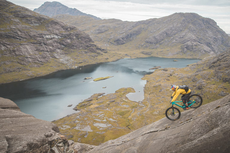 Danny MacAskill descending the Dubh Slabs on the Isle of Skye. Photo by Dave Mackison