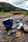 Taking a creekside rest break in the San Juan mountains. Photo by Alex Stewart