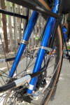 Our temporary front rack fix using hose clamps. Photo by Alex Stewart