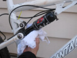 Wipe off the dust from the rear shock too. Photo by Eric Ramirez