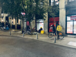 Deliveristas waiting. Cycling in Madrid, Spain, 2024. Photo by Dave Iltis