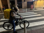 On a food run… Cycling in Madrid, Spain, 2024. Photo by Dave Iltis
