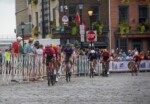 Riders finding the smoothest line through the cobbles.