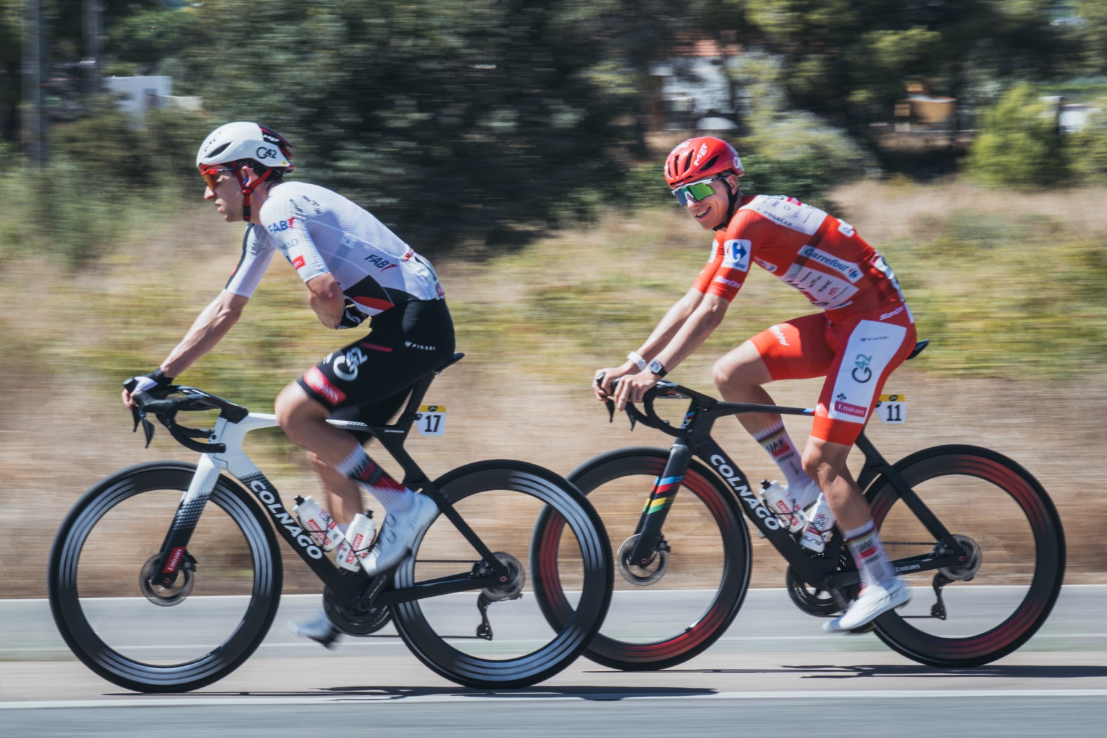 Tadej in red before crashing out. 29/08/2026 - La Vuelta 2026 - Stage 8 - Puçol > Xeraco (171 Km) - Tadej POGACAR (UAE TEAM EMIRATES XRG). Photo: Toni Baixauli/ASO
