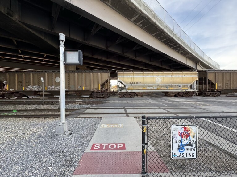 A train blocking the 9-Line Bike Path in Salt Lake City. This could benefit from the Railroad Crossing Elimination Program (but not likely that it will). Photo by Dave Iltis